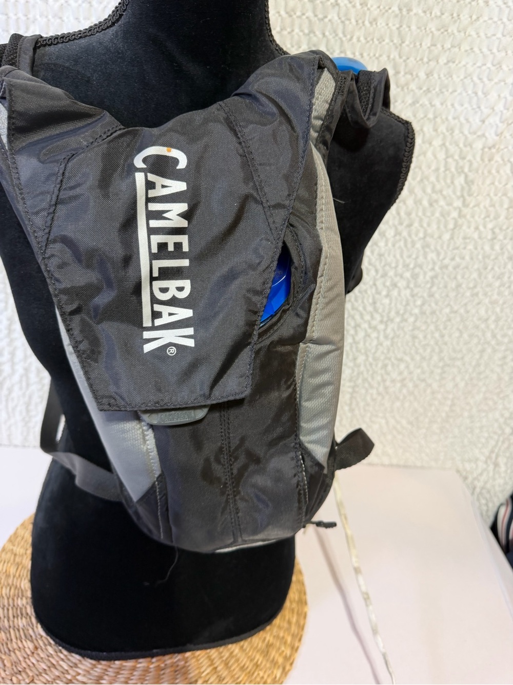 Camelbak Black and Gray Hydration Vest with Blue Reservoir Accent